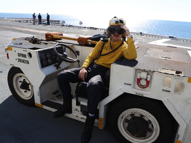 One of the flight deck crew on board the USS America as it sailed into Brisbane on Tuesday afternoon. Picture: Liam Kidston