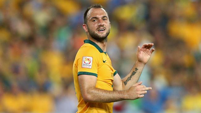 SYDNEY, AUSTRALIA - JANUARY 13: Ivan Franjic of the Socceroos reacts during the 2015 Asian Cup match between Oman and Australia at ANZ Stadium on January 13, 2015 in Sydney, Australia. (Photo by Cameron Spencer/Getty Images)