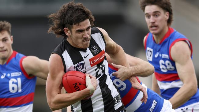 MELBOURNE, AUSTRALIA - MAY 14: Reef McInnes of the Magpies competes for the ball  during the round eight VFL match between the Collingwood Magpies and the Footscray Bulldogs at AIA Centre on May 14, 2022 in Melbourne, Australia. (Photo by Martin Keep/Getty Images)