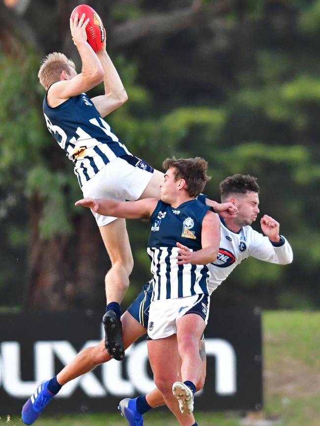 Curtis McCarthy takes a hanger for Geelong. Picture: Stephen Harman