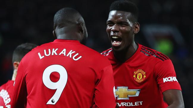 MANCHESTER, ENGLAND - DECEMBER 30:  Romelu Lukaku of Manchester United celebrates after scoring his team's fourth goal with Paul Pogba during the Premier League match between Manchester United and AFC Bournemouth at Old Trafford on December 30, 2018 in Manchester, United Kingdom.  (Photo by Clive Brunskill/Getty Images)