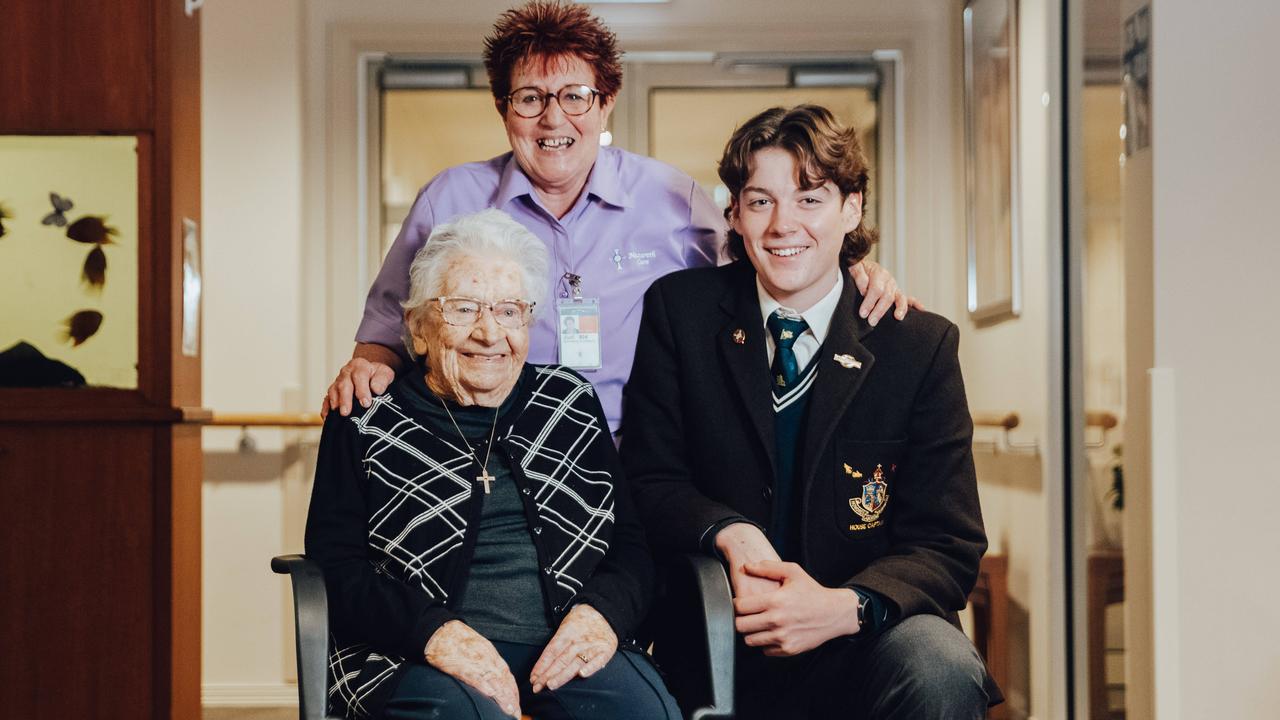 Year 12 student Tom McCarthy with lifestyle assistant Judi Link and resident Julie Duffy. Picture: Chloe Smith