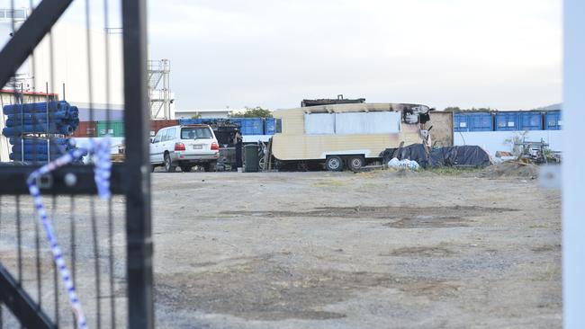 A man has been found dead after a fire broke out at a scrap yard in Mount Louisa on Thursday night. Picture: Natasha Emeck