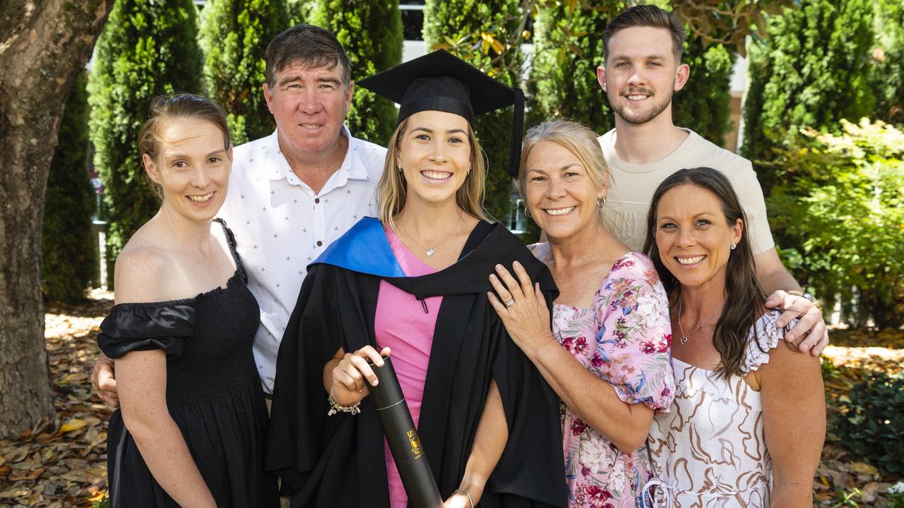 Bachelor of Nursing graduate Libby Burgess with family (from left) Taylah Burgess, Michael Burgess, Alison Burgess, Toby Patrick and Kate Morris at the UniSQ graduation ceremony at Empire Theatres, Wednesday, December 14, 2022.