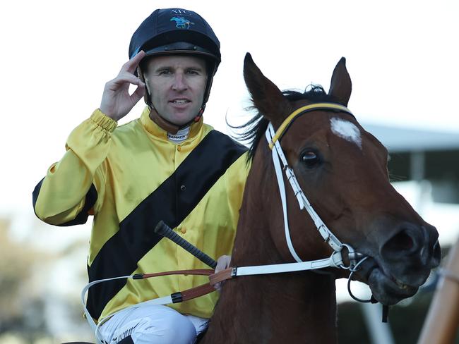 SYDNEY, AUSTRALIA - AUGUST 03: Tommy Berry riding Nosey Parker wins Race 7 Jockeys Celebration Day during Sydney Racing at Rosehill Gardens on August 03, 2024 in Sydney, Australia. (Photo by Jeremy Ng/Getty Images)