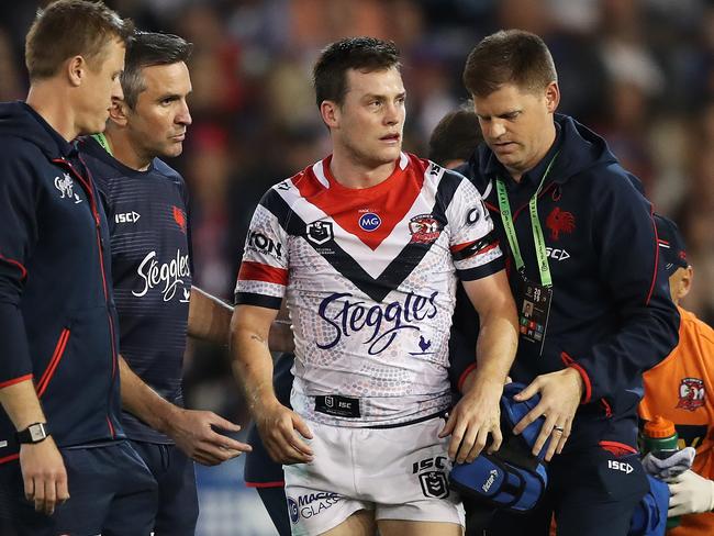 Luke Keary leaves the field after a head knock during the Sydney Roosters v Newcastle Knights NRL match at McDonald Jones Stadium, Newcastle. Picture: Brett Costello