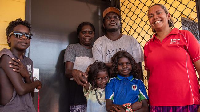 Minister Selena Uibo with Walter Garawirrtja, Madeline Gurruwiwi, Tobias Garawirrtja, Carlina Garawirrtja, Liana Garawirrtja who received the keys to their brand new home in Gapuwiyak on Wednesday. Picture: Pema Tamang Pakhrin