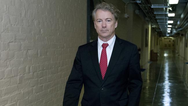 Rand Paul walks to his office after speaking on the senate floor. Picture: AP