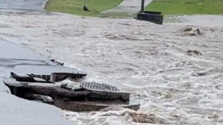 Maudsley Rd at Goomer was broken in half by the flood water.