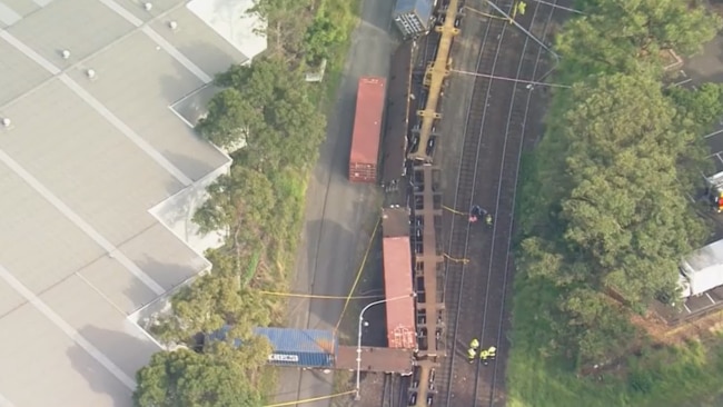 Some carriages of a freight train that derailed in Banksmeadow were tipped on its side. Picture: Supplied