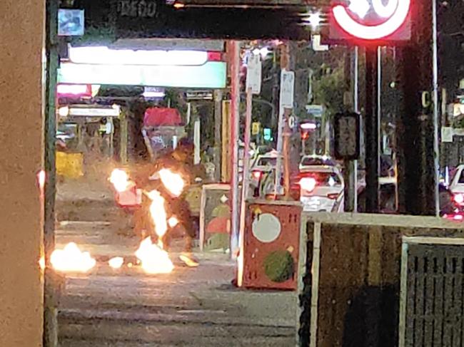 Footage shows one of the offenders setting himself on fire. Picture: Supplied