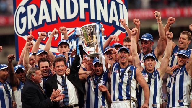 The Kangaroos celebrate their 1999 AFL grand final win against Carlton.