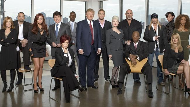 The cast of the 2010 season of Celebrity Apprentice, including Cyndi Lauper (front and right of Trump), who stuck up for West.