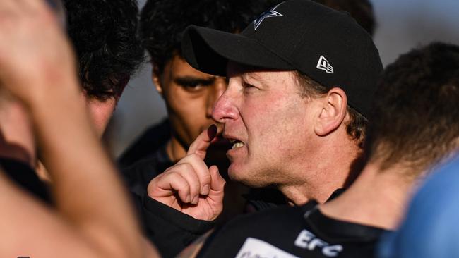 Brad Hollow talks to his players. Picture: Nathan McNeill