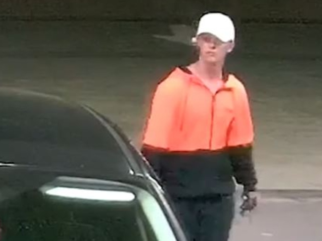 The alleged robber’s face was shown on camera outside. Image: Queensland Police