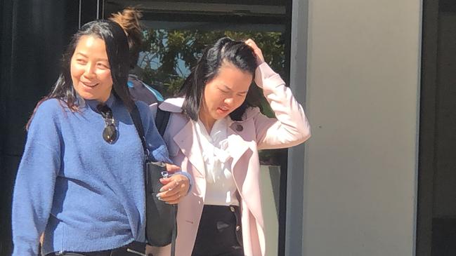 Pham Van Anh Nguyen (right) leaves Southport Courthouse. Picture: Lea Emery.