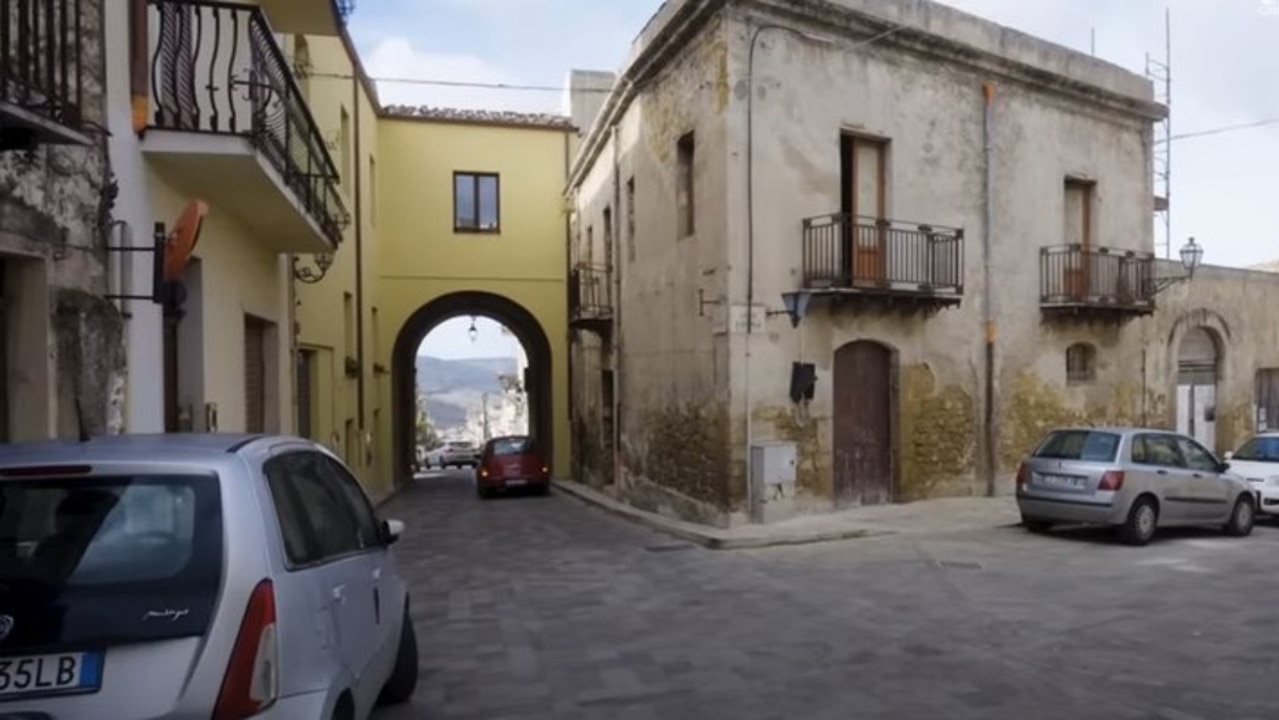 The original property was old, abandoned, and shared a wall with the house next door. Picture: CNBC Make It/YouTube