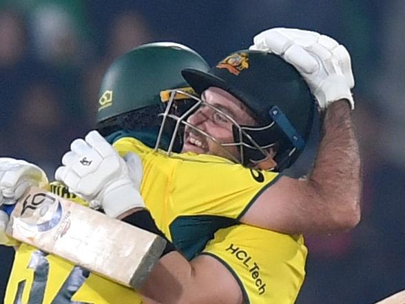 LAHORE, PAKISTAN - FEBRUARY 22: Josh Inglis of Australia celebrates his century during the ICC Champions Trophy 2025 match between Australia and England at Gaddafi Stadium on February 22, 2025 in Lahore, Pakistan. (Photo by Sameer Ali/Getty Images)