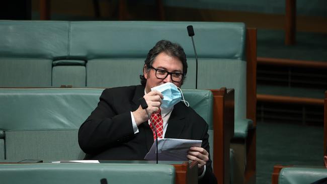 The member for Dawson George Christensen stirring the pot by not wearing a mask for a few minutes during Question Time in the House of Representatives in Parliament House today. Picture: NCA NewsWire / Gary Ramage