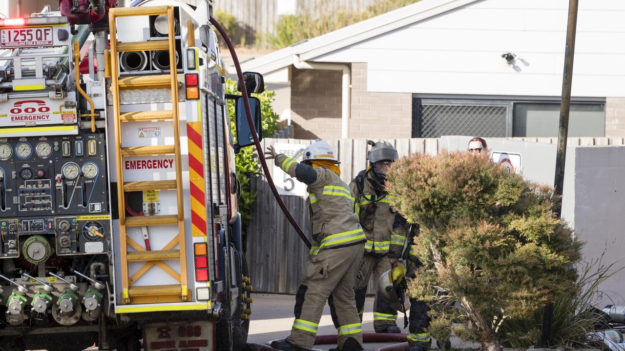 Emergency services attend a fire in a unit complex in James St, Harristown. Picture: Kevin Farmer