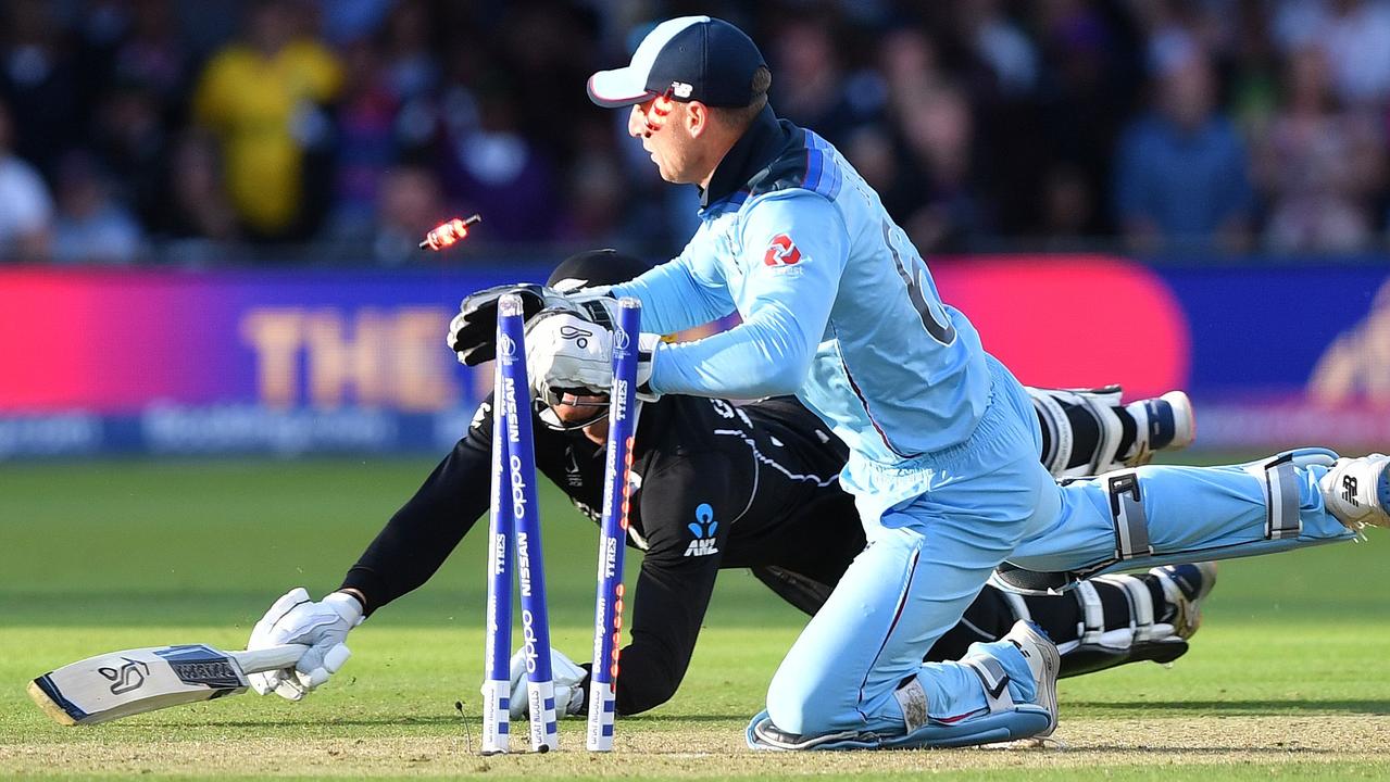 Jos Buttler runs out Martin Guptill as England downs the Kiwis in the World Cup final.