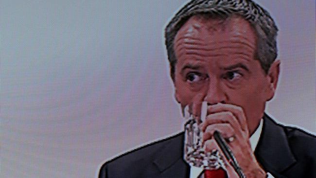 Bill Shorten sips water as he gives evidence before the Royal Commission into Trade Union Governance and Corruption. Picture: Justin Sanson.