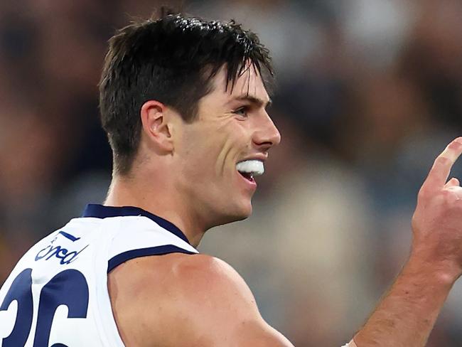 MELBOURNE, AUSTRALIA - APRIL 27: Oliver Henry of the Cats celebrates kicking a goal during the round seven AFL match between Geelong Cats and Carlton Blues at Melbourne Cricket Ground, on April 27, 2024, in Melbourne, Australia. (Photo by Quinn Rooney/Getty Images)