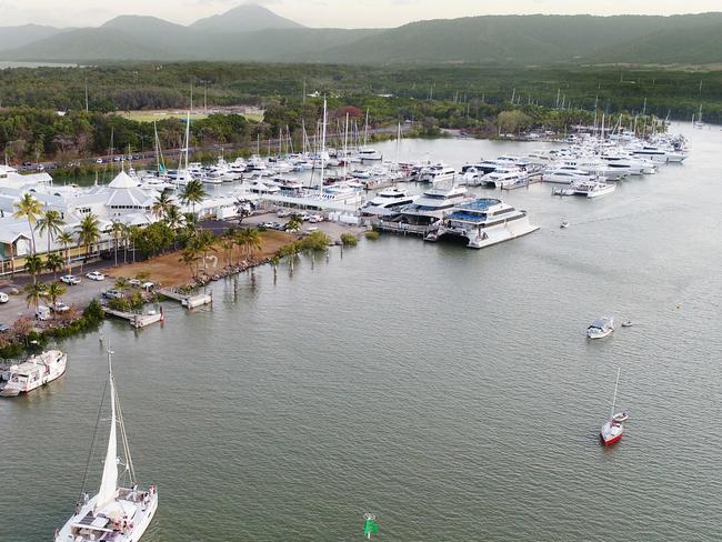 A yacht carrying toursits sails into the Crystalbrook Collection owned Port Douglas marina. The hotel chain has plans to redevelop the marina to include a five star hotel and luxury villas. PICTURE: BRENDAN RADKE