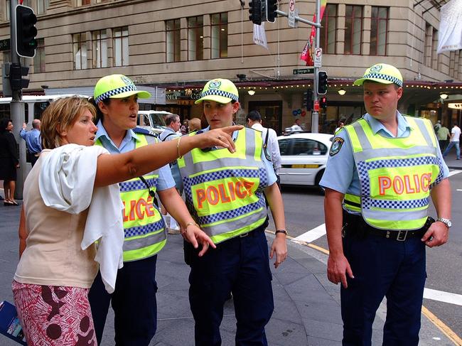 Former police officer Victoria Beresford (left) on duty in Sydney. She retired in 2016 as an inspector.