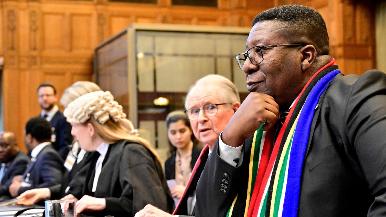 South African ambassador to the Netherlands Vusimuzi Madonsela (R) attends a hearing at the International Court of Justice as part of South Africa's request on a Gaza ceasefire in The Hague, on May 24, 2024. (Photo by Nick Gammon / AFP)