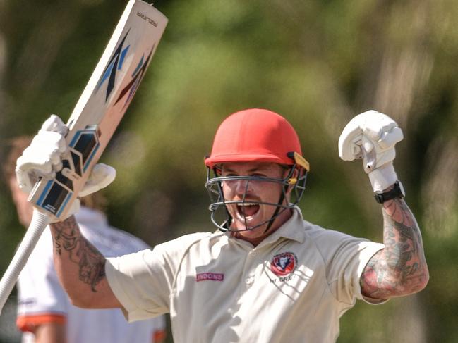 27 March 2022: Claye Beams celebrates after hitting the winning runs to claim a grand final victory for Surfers Paradise.