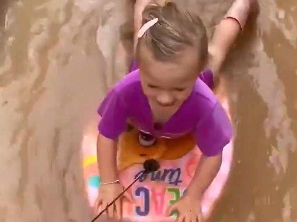 This little lass tried boogie boarding near Kimba. Picture: 7NEWS