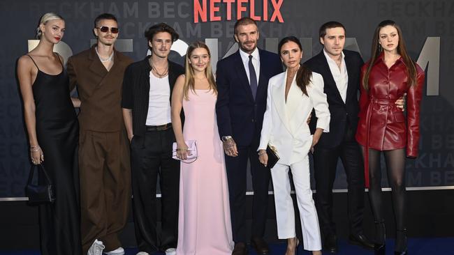 David and Victoria Beckham with their four children and their partners. Picture: Getty Images