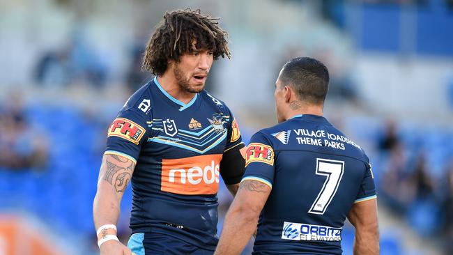 GOLD COAST, AUSTRALIA - JULY 26: Kevin Proctor of the Titans speaks with Jamal Fogarty (R) during the round 11 NRL match between the Gold Coast Titans and the Penrith Panthers at Cbus Super Stadium on July 26, 2020 in Gold Coast, Australia. (Photo by Matt Roberts/Getty Images)