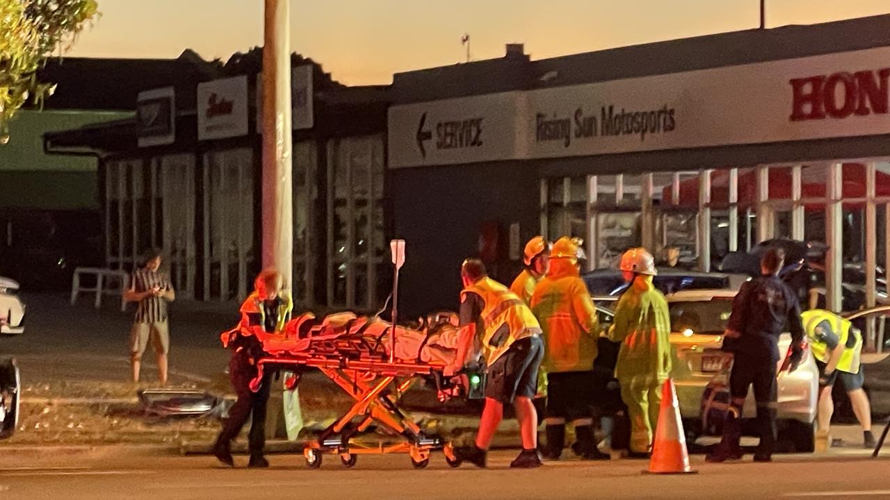 Emergency services work to free motorist after a two-vehicle crash in Rosslea on Friday evening. Photo: Leighton Smith.