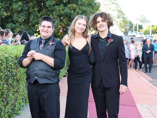 Garrett Nelsen-Taylor, Ava Karpowski and Tobi Friedrich at the 2023 Isis State High School formal. Image credit: Isis SHS.