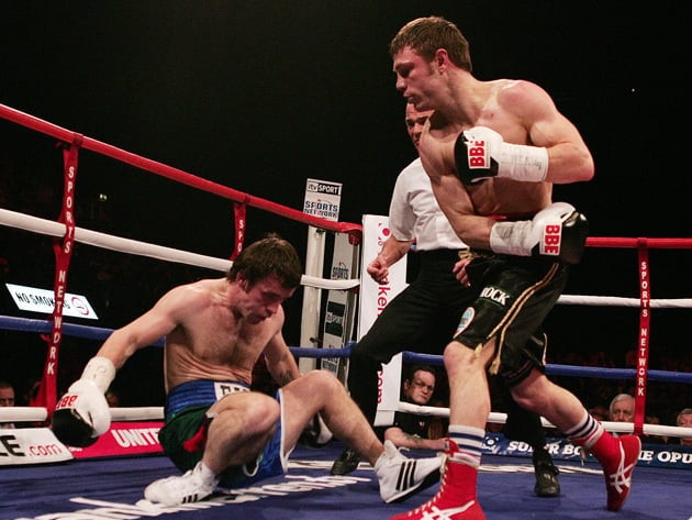 Michael Katsidis drops Graham Earl with a right during their shoot out in London in 2007. (Photo: Carl De Souza/ AFP)