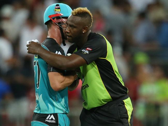 Andre Russell (right) congratulates Chris Lynn after the match.