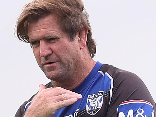 Coach Des Hasler signals to the media manager to end the media's time at the Canterbury Bulldogs training session at Belmore Sportsground. Picture. Phil Hillyard