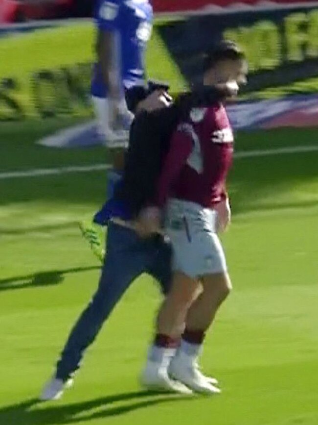 Paul Mitchell hit Grealish from behind.