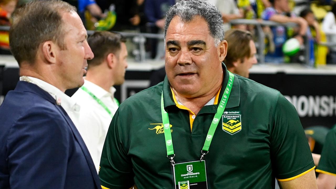 TOWNSVILLE, AUSTRALIA - OCTOBER 14: Darren Lockyer and Kangaroos coach Mal Meninga speak on field after the Mens Pacific Championship match between Australia Kangaroos and Samoa at Queensland Country Bank Stadium on October 14, 2023 in Townsville, Australia. (Photo by Ian Hitchcock/Getty Images)