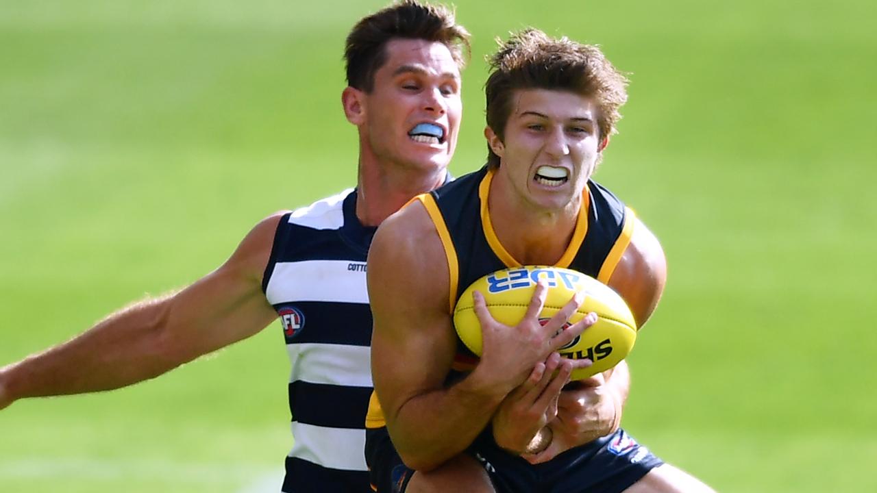 Jordan Butts outmarks Coleman medallist Tom Hawkins in Round 1.