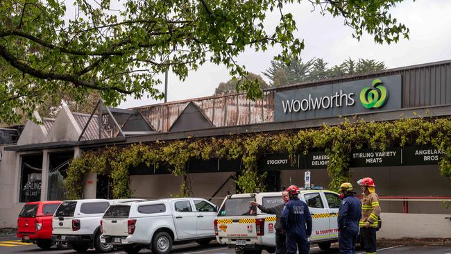 Fire investigators at the scene of the Stirling Village Shopping centre fire on Monday after it was completely destroyed. Picture: Naomi Jellicoe