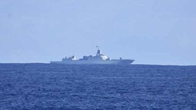 A Chinese Warship south of Tasmania, inside the Australian EEZ, and moving west, as seen from New Zealand's HMNZS Te Kaha and Seasprite helicopter. Picture: New Zealand Defence Force