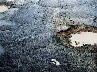 Patch work of pot holes and repair work along Lennox Heads Park Lane.