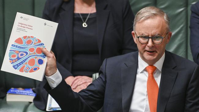 Anthony Albanese in parliament last month with the final report of the Indigenous Voice Co-design Process. Picture: NCA NewsWire / Martin Ollman