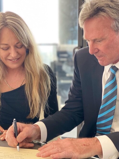 Sam Newman and wife Amanda Brown on their wedding day.