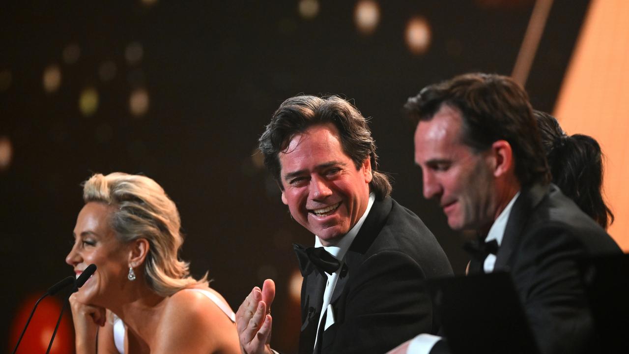 Outgoing AFL boss Gillon McLachlan (centre) says the Brownlow Medal should not be meddled with. Picture: Morgan Hancock / Getty Images