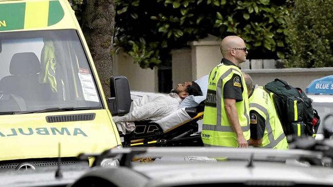 Ambulance staff take a man from outside a mosque in central Christchurch, New Zealand, Friday, March 15, 2019. (AP Photo/Mark Baker). Picture: Mark Baker