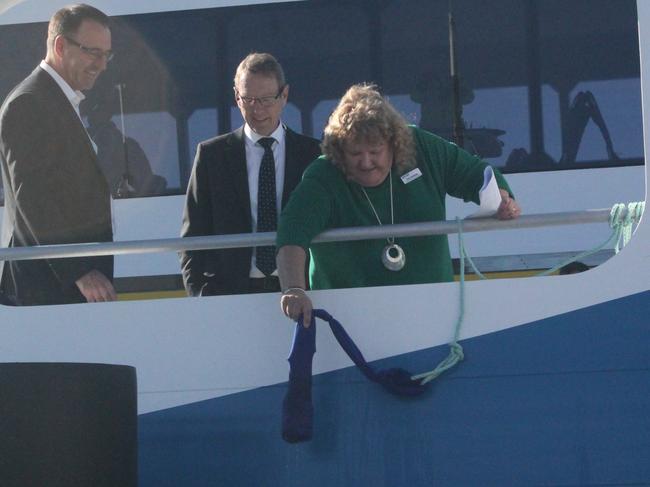 SeaLink’s new Bruny Island passenger vessel Parrabah is christened with a bottle of Bruny Island wine. Picture: ANNIE MCCANN